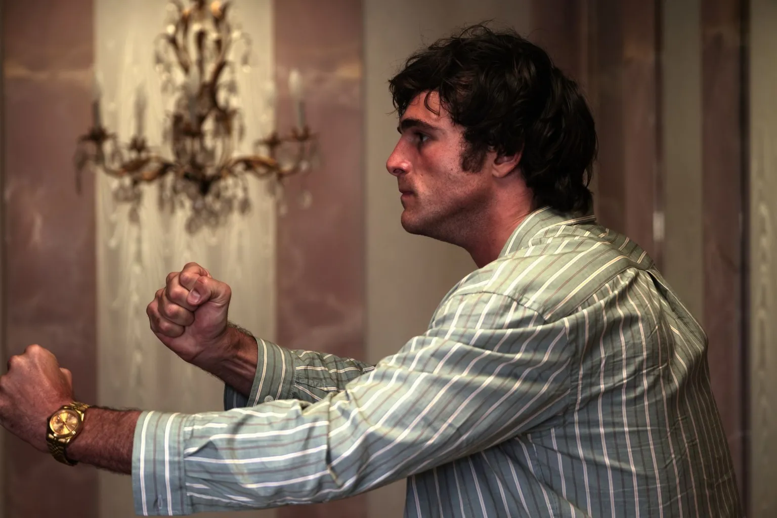 Eddy Chen/HBO Jacob Elordi as Nate with his fists in the air