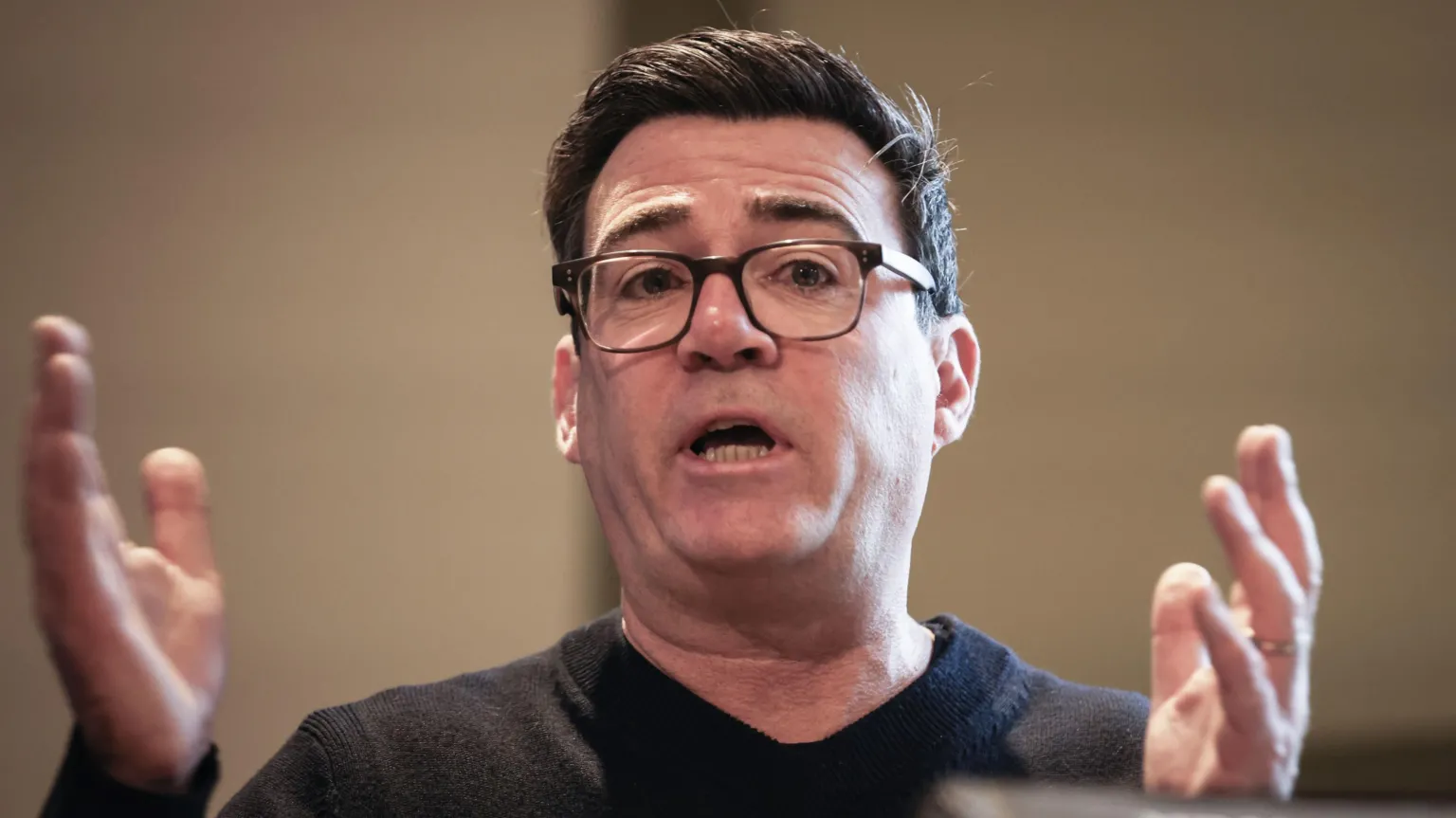 PA Media Andy Burnham in a dark jumper.