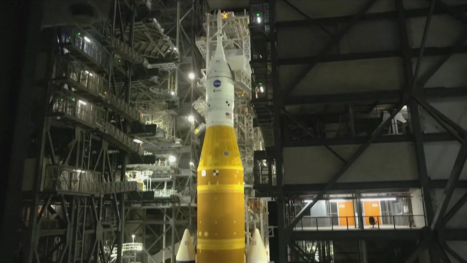 Artemis II rocket lit up at night