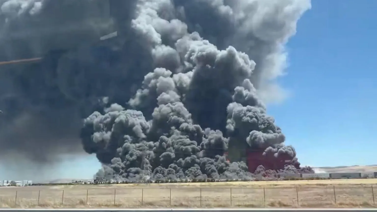 Big black clouds of smoke are seen.