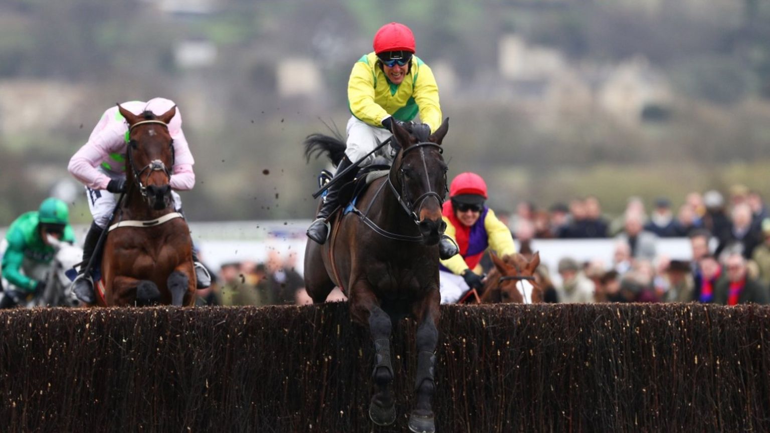 Sizing John is steered to victory by Robbie Power in the Timico Cheltenham Gold Cup Chase
