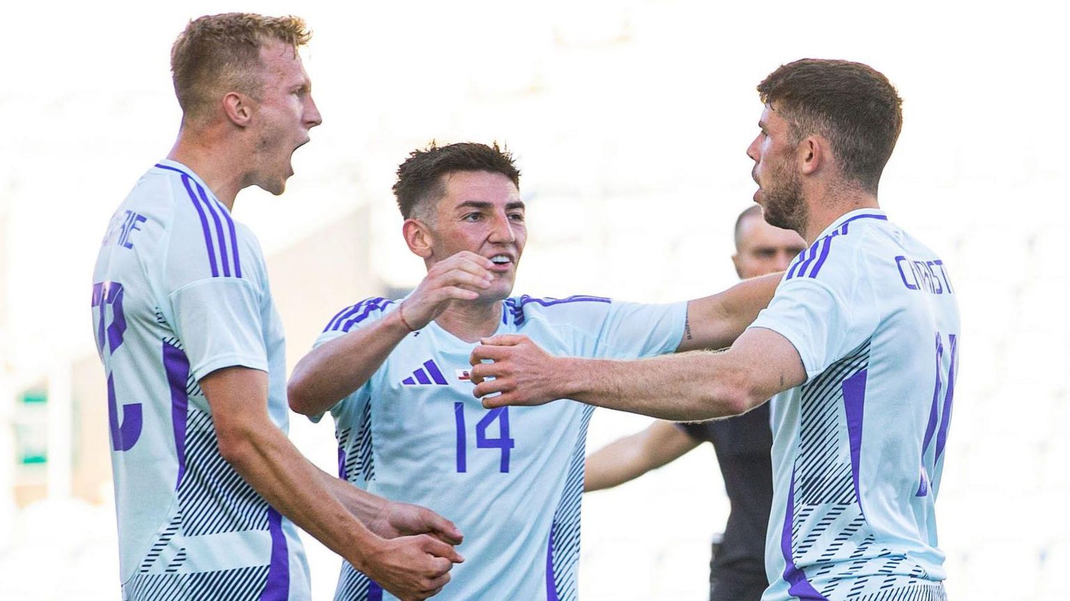 Scotland's Ryan Christie celebrates with Ross McCrorie and Billy Gilmour after scoring to make it 1-0 during an International Friendly match between Gibraltar and Scotland at Estadio Algarve,