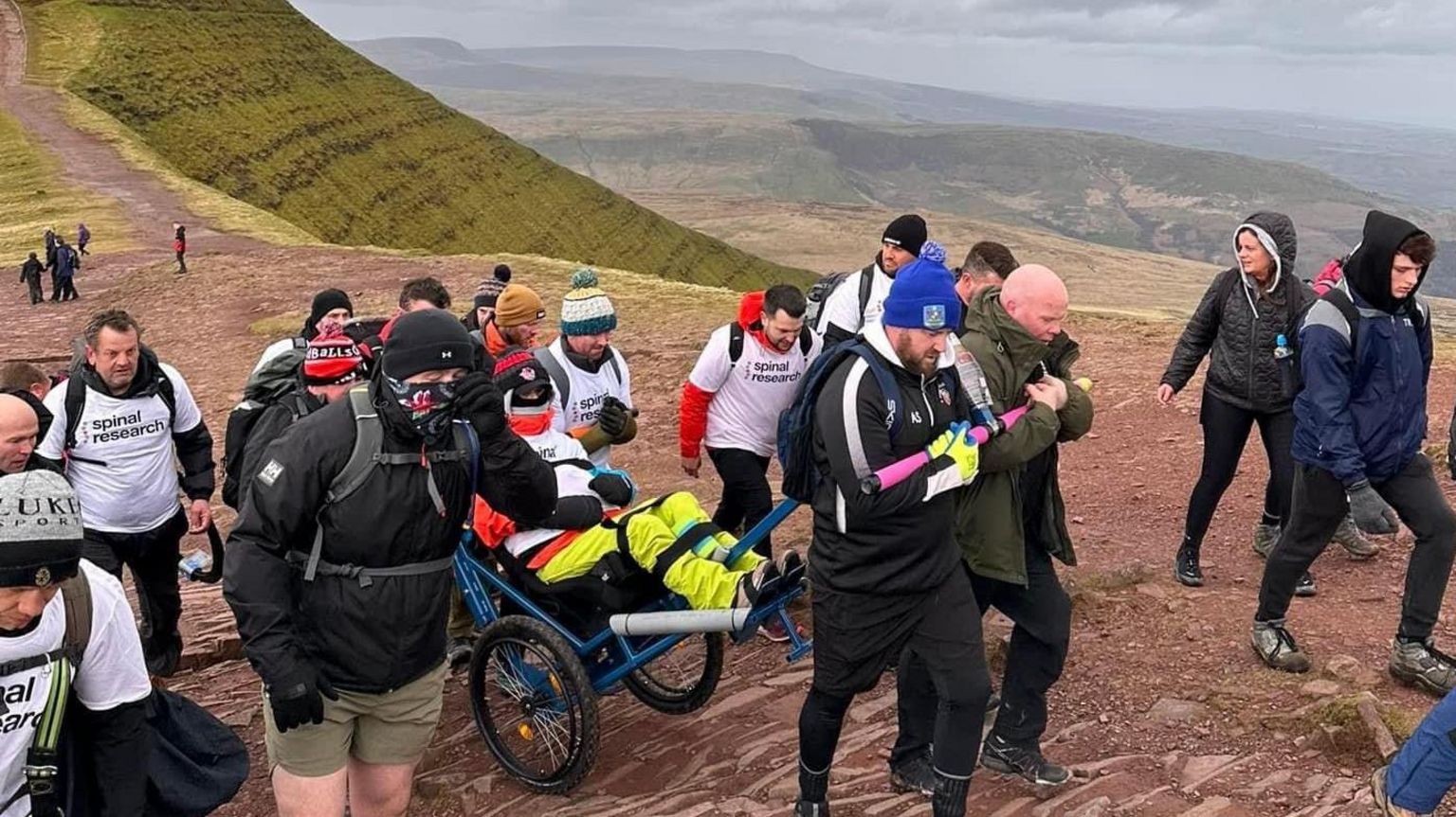 Jon Hobbs and helpers climb Penyfan 