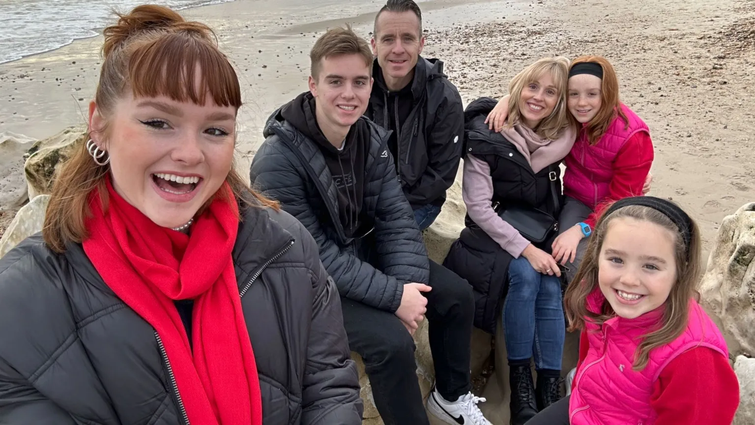 Simon Dunning Matthew Dunning with his sisters and parents on a beach
