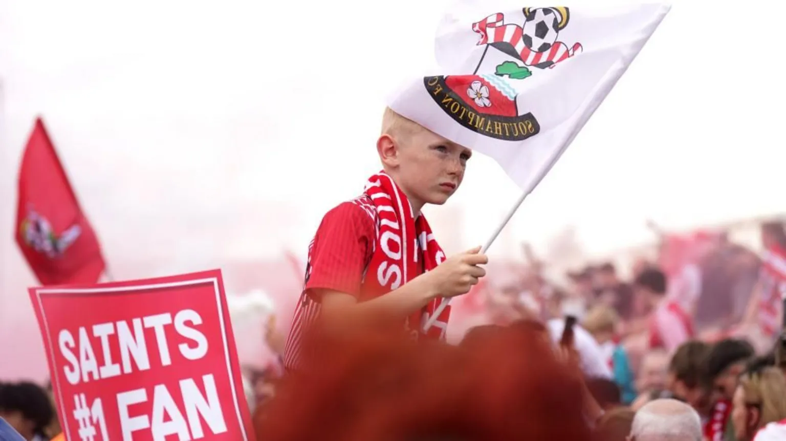 PA Media Boy in crown waving Southampton FC flag