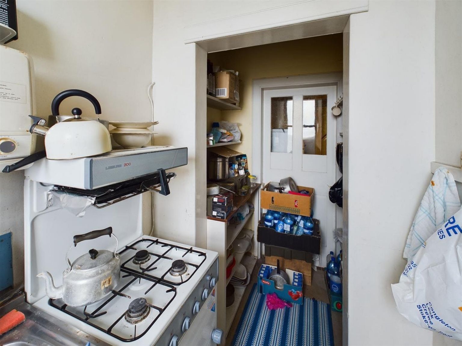 Interior of a small kitchen with a gas cooker