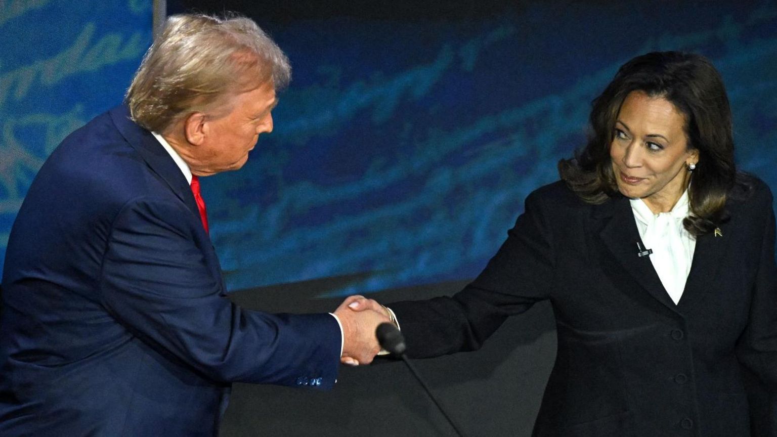 Trump and Harris shake hands