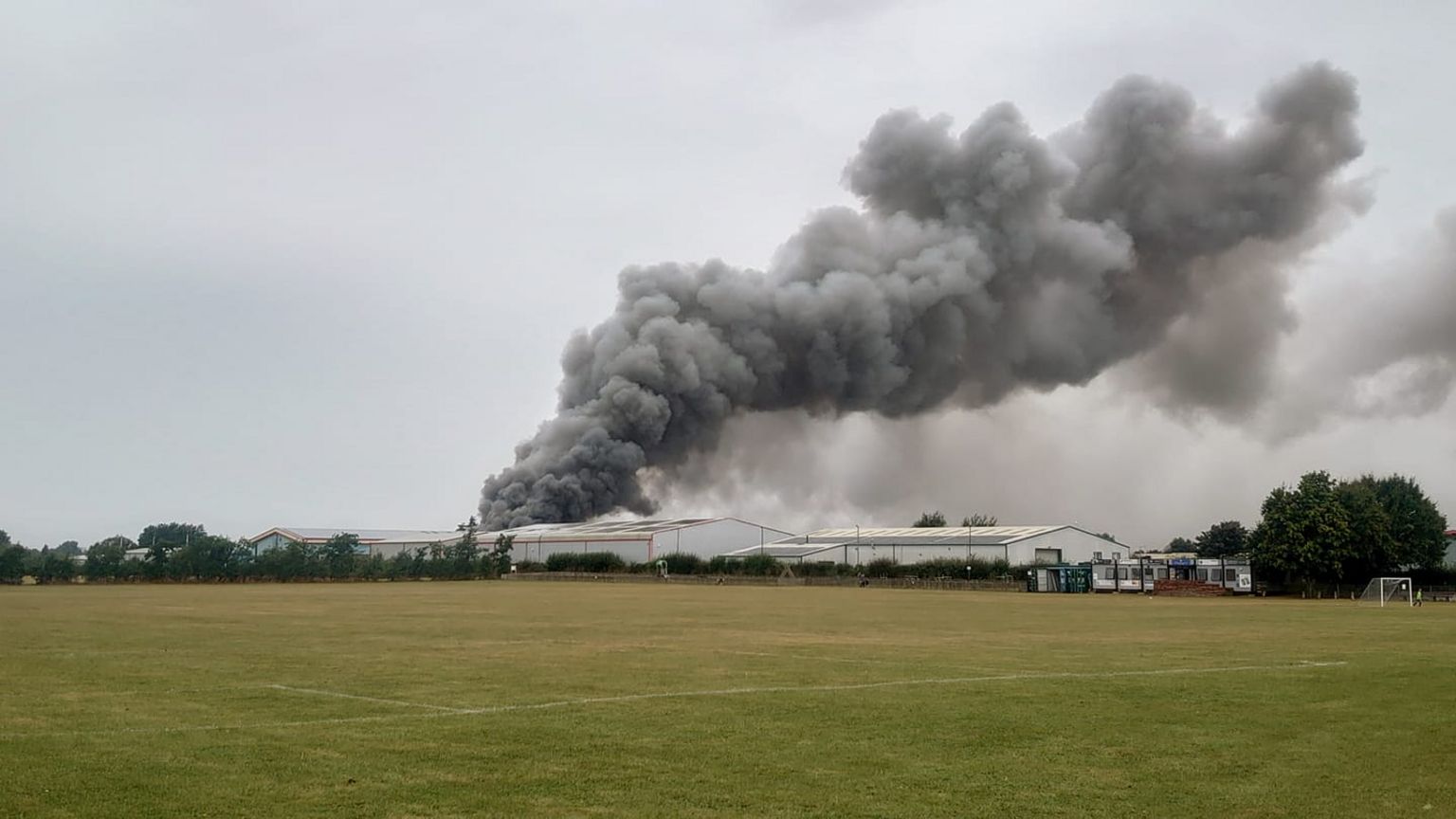 Smoke billowing into the sky.