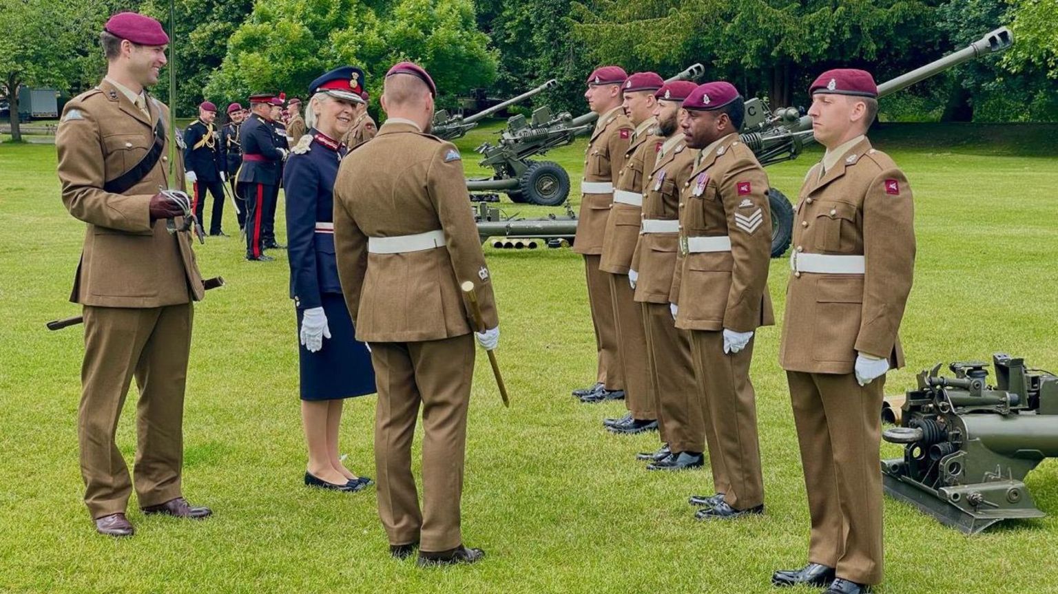 Jennifer Tolhurst in Lord Lieutenant's uniform inspecting troops in ceremonial uniform 