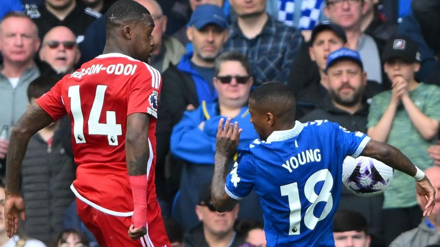 The ball appears to strike Ashley Young's right arm with Callum Hudson-Odoi next to him on his left hand side after crossing the ball