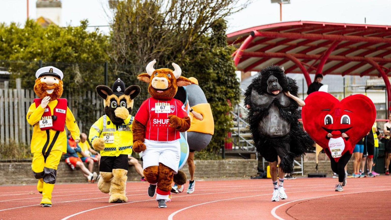 participants wearing mascot costumes 