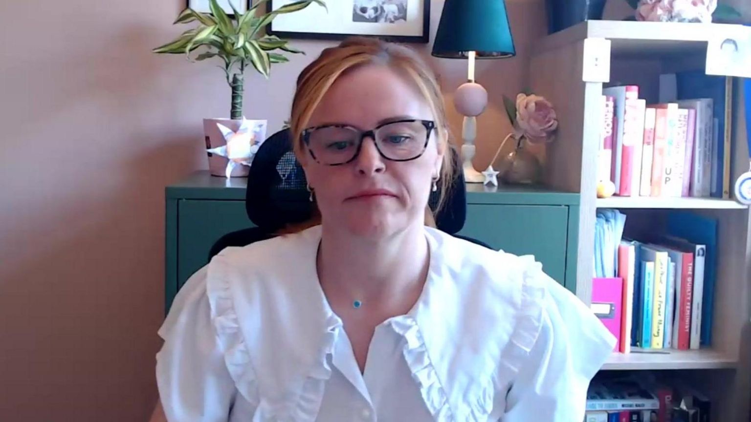 Abbee McLatchie sitting at a desk