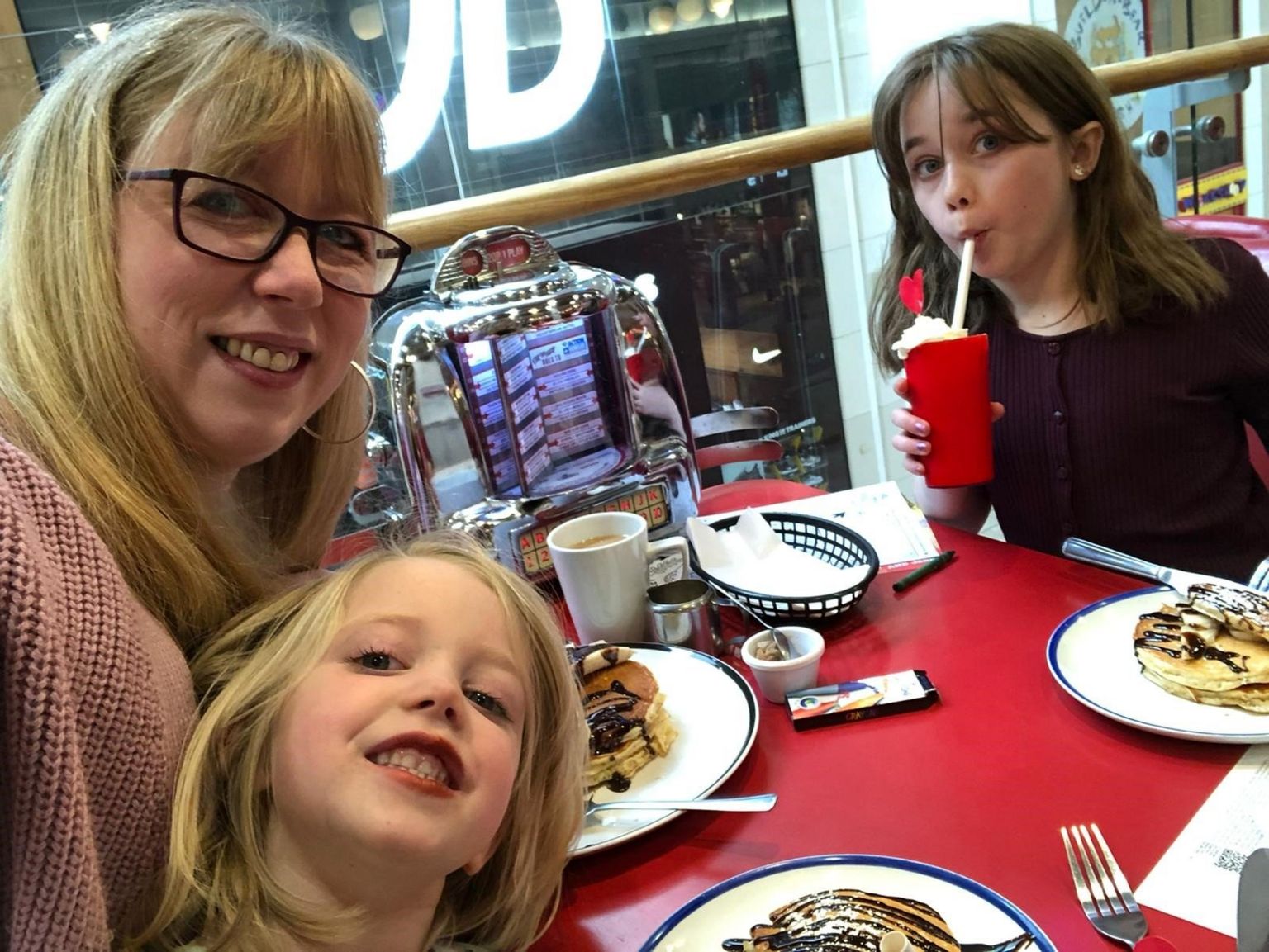 Claire Yaxley with her two daughters.