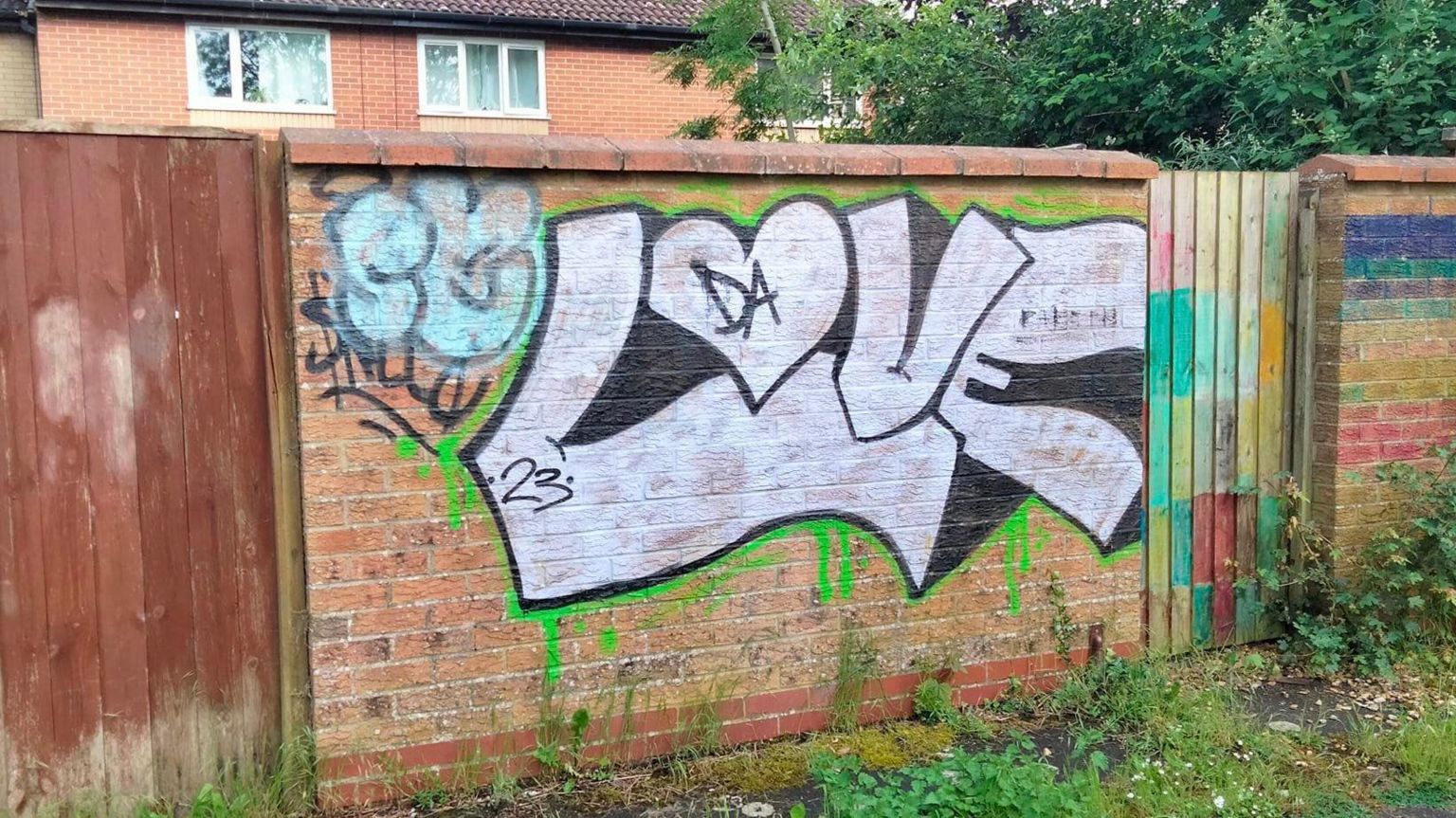 Graffiti on a outer brick wall