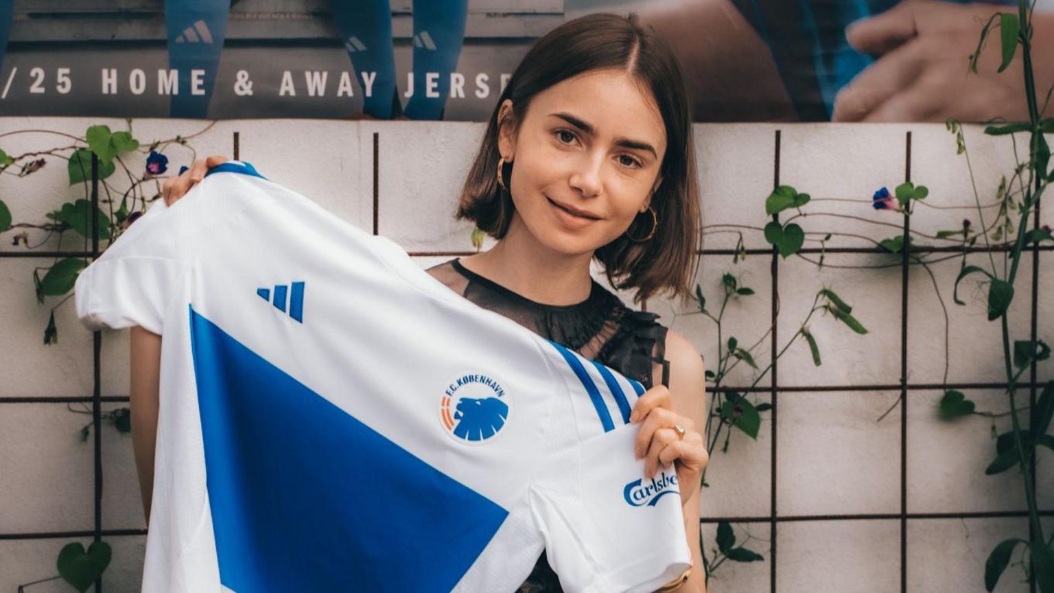 Lily Colins poses with Copenhagen's new women's shirt