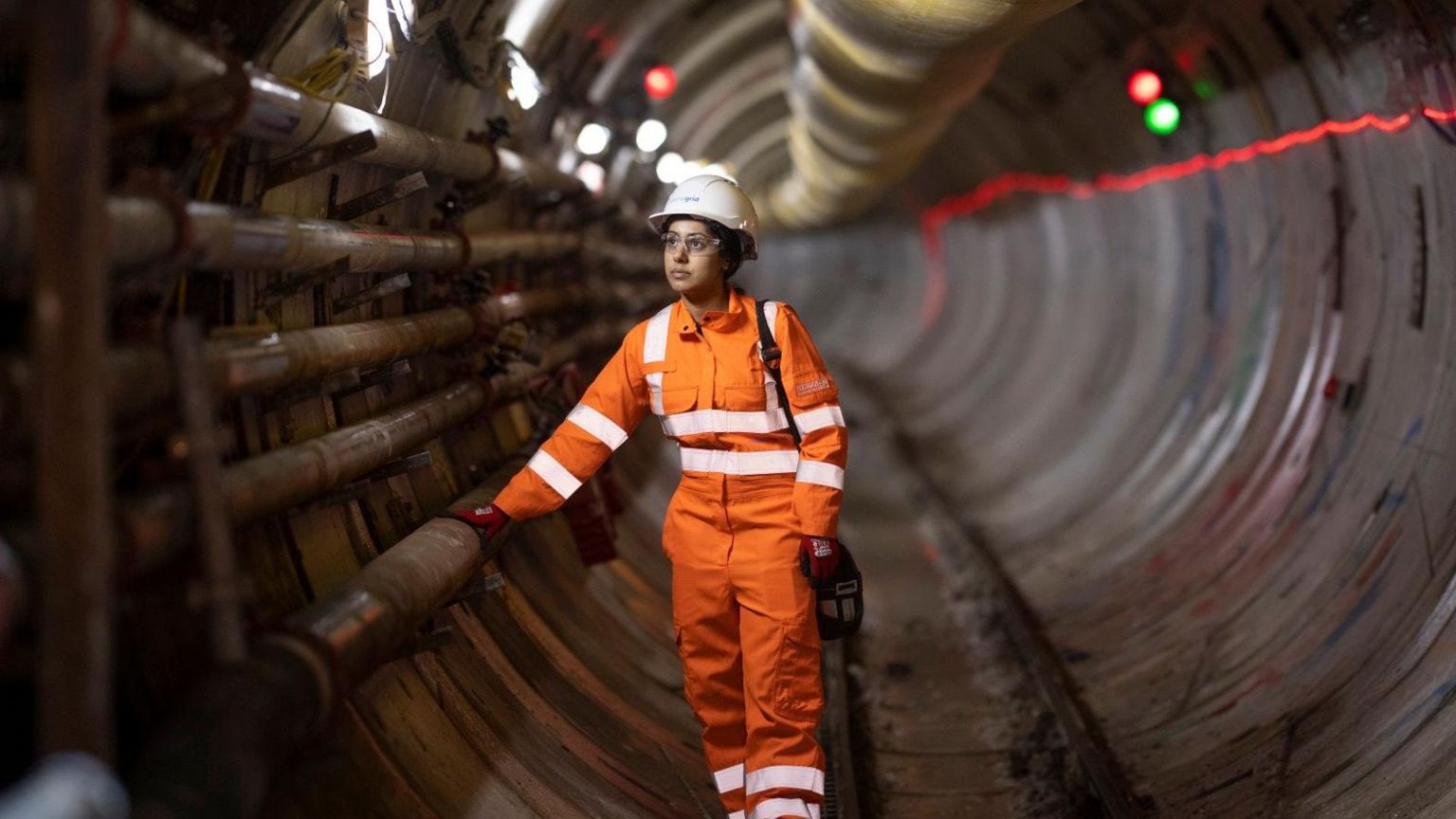 A female engineer in high viz protective clothing