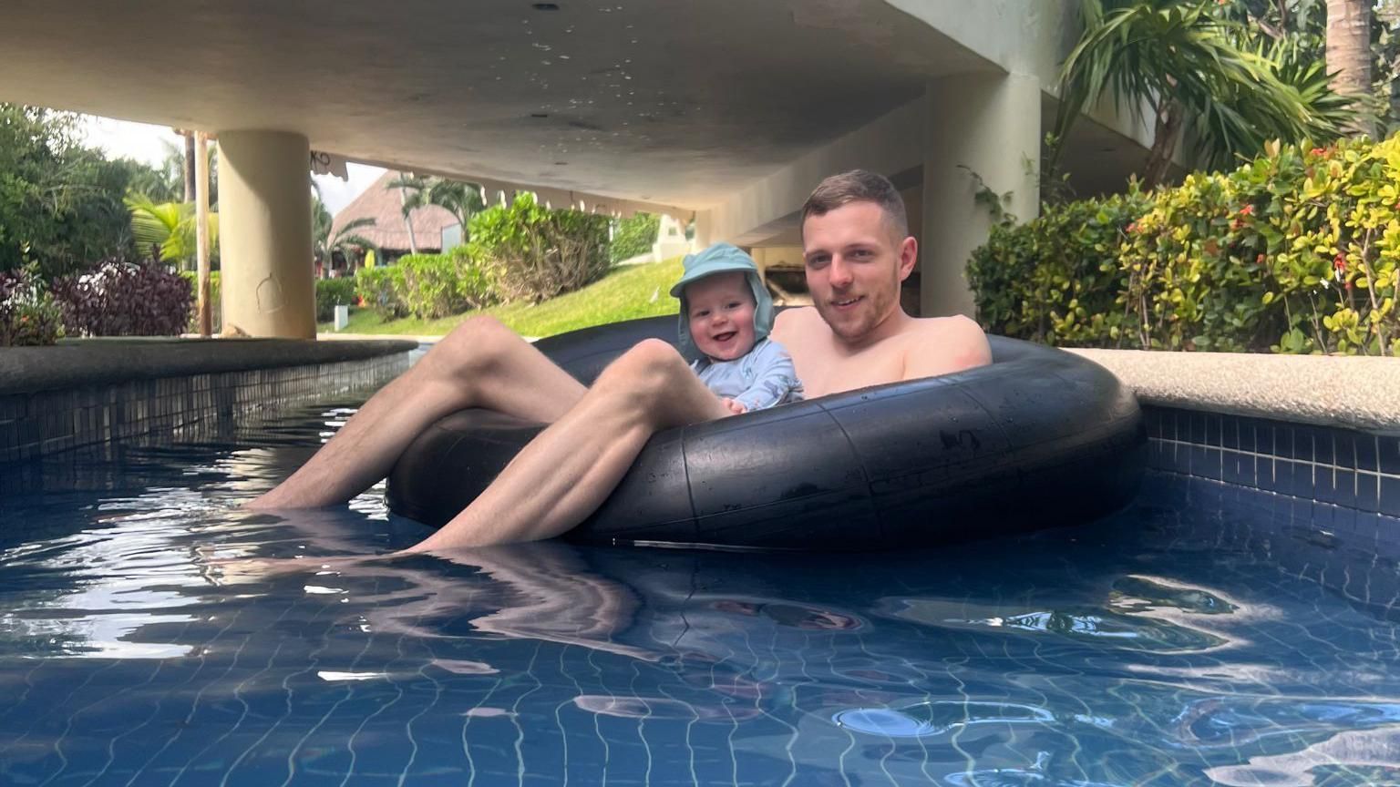 Ben Kirk and his son on holiday