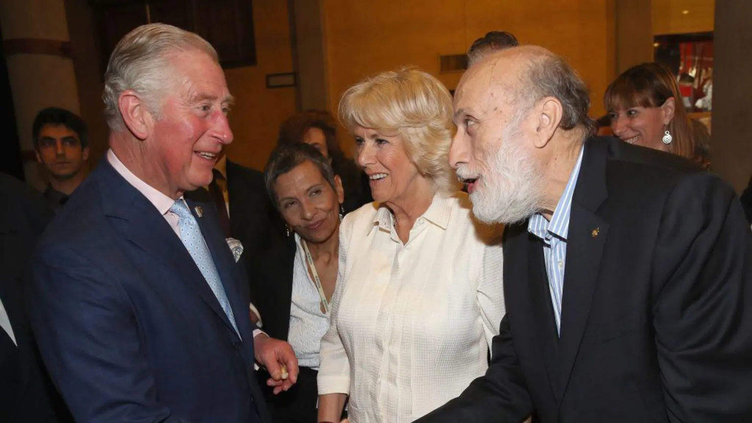 The then Prince of Wales and Duchess of Cornwall were pictured with Petrini at Sant'Ambrogio Market in 2017