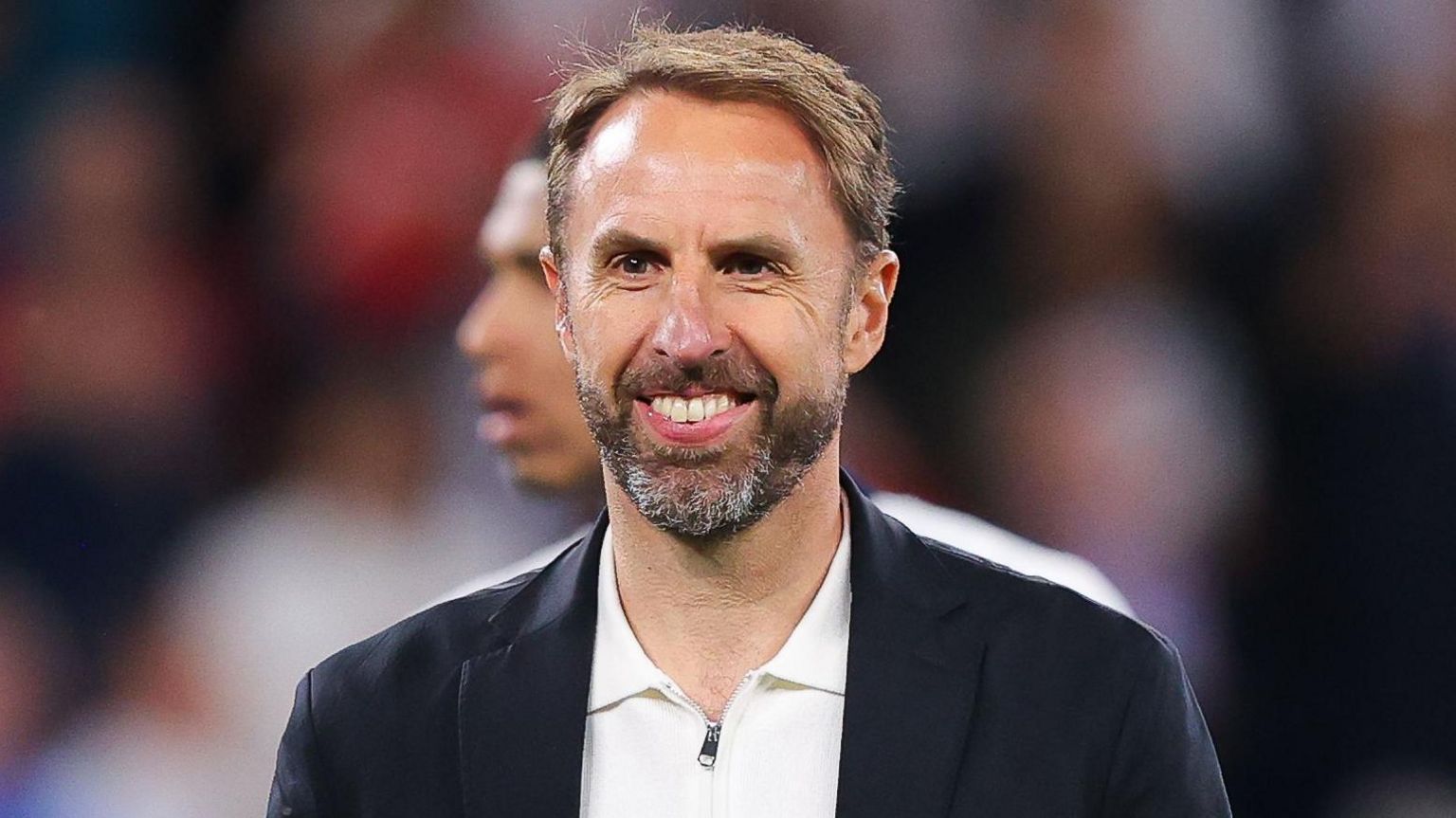 Photo of England manager Gareth Southgate smiling