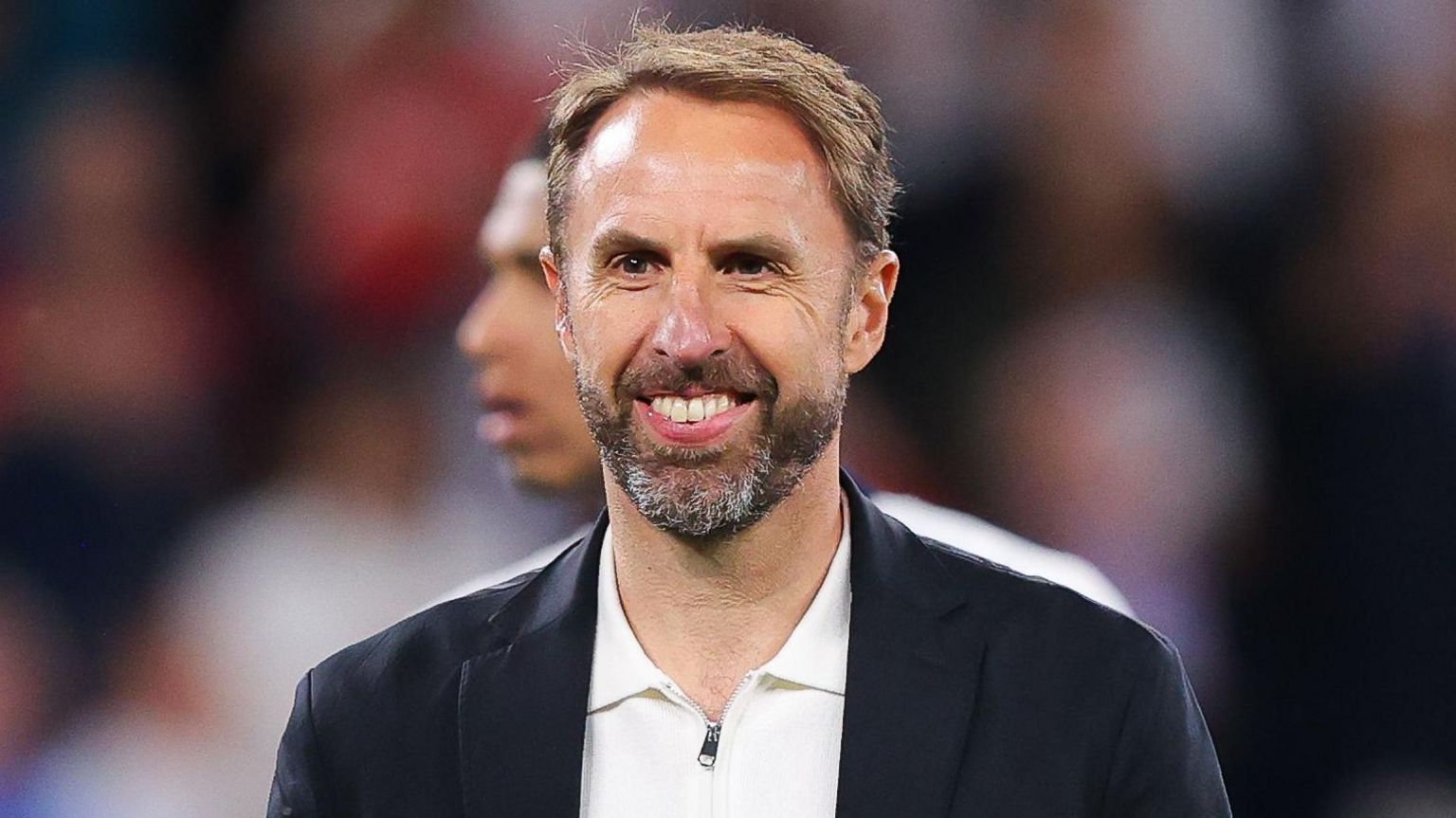 Photo of England head Gareth Southgate smiling