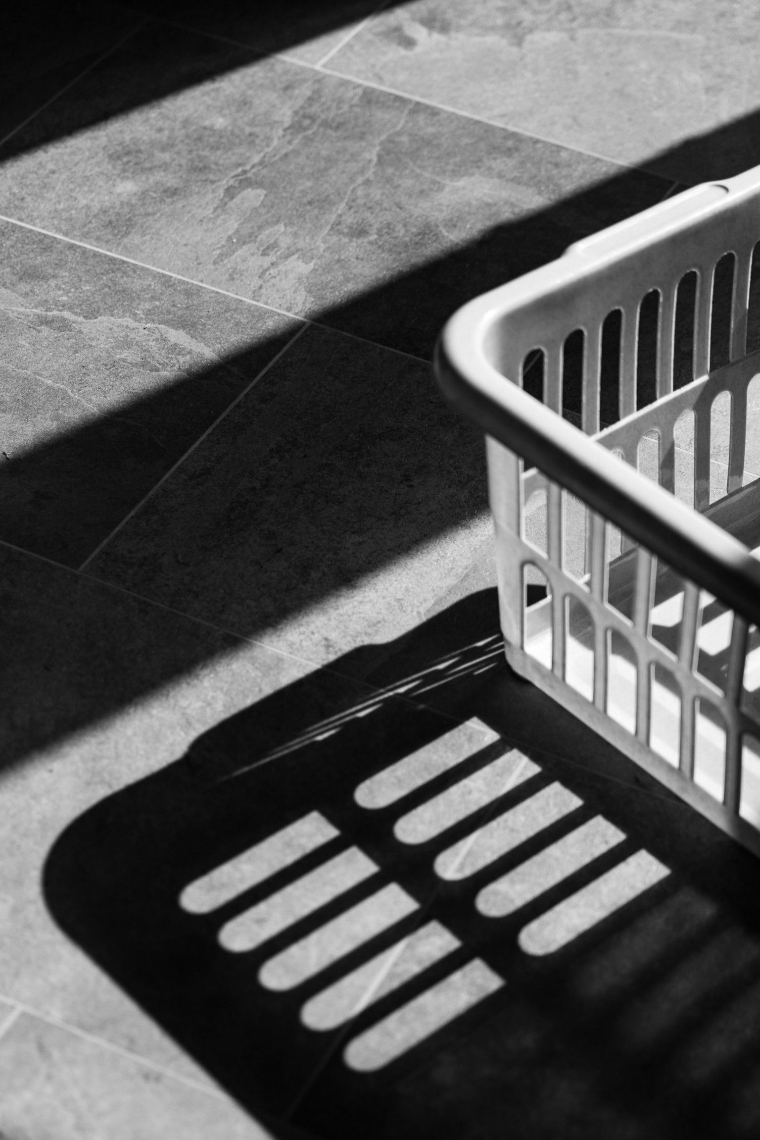 Shadow of a washing basket