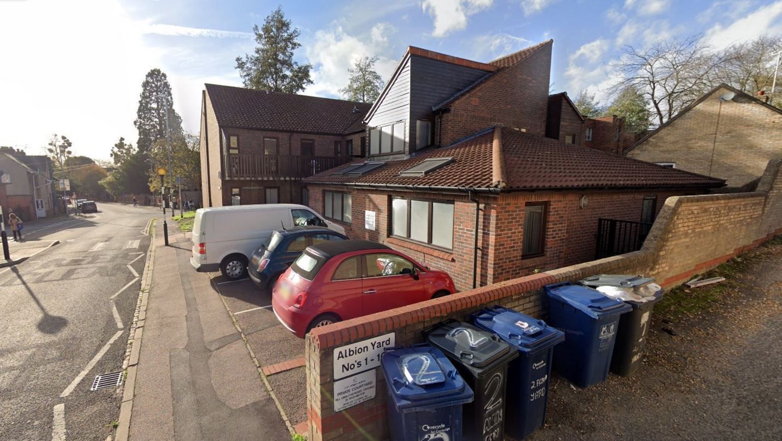Edward House care home with cars parked outsideside