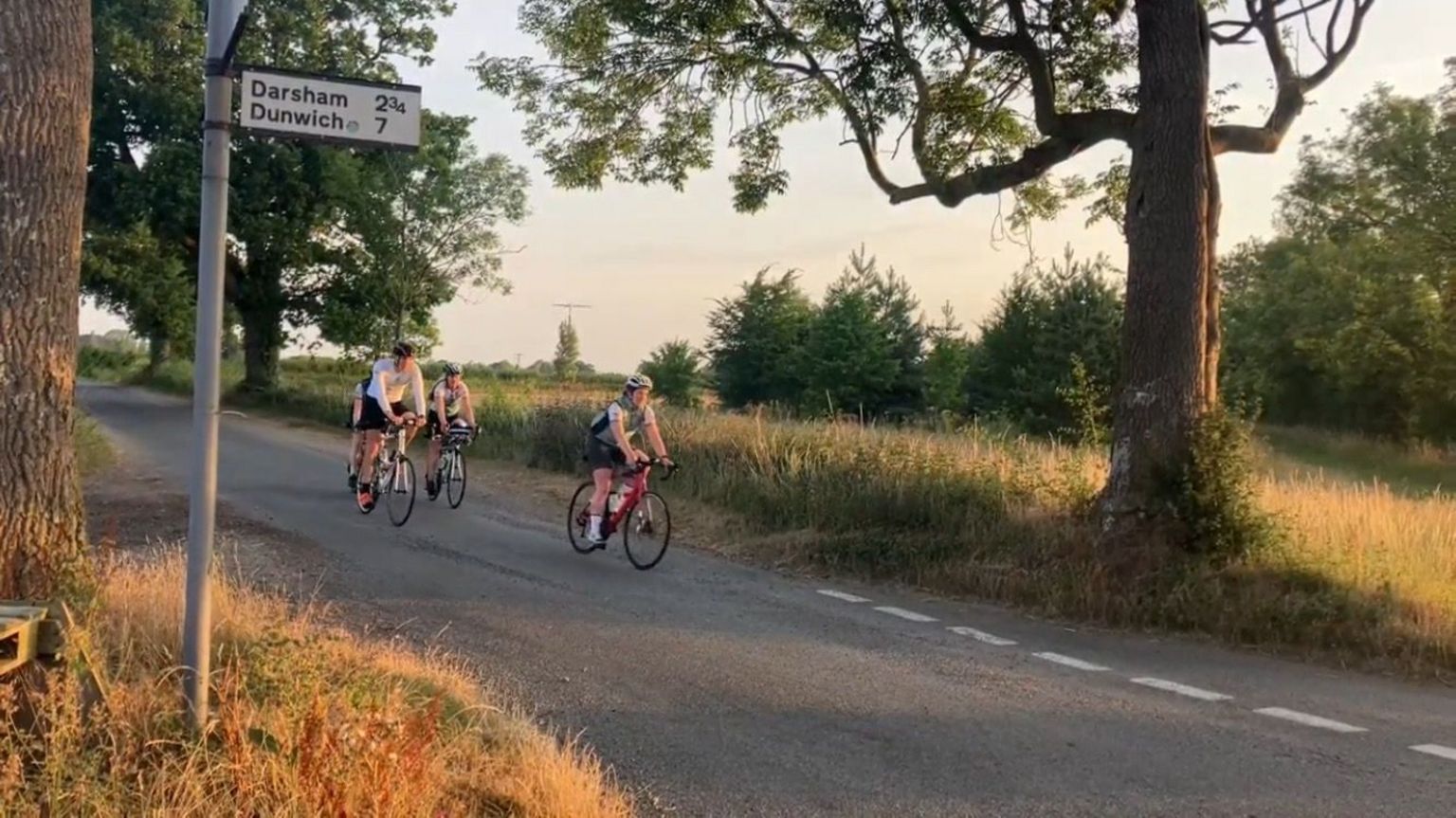 Dunwich Dynamo riders during sunrise mid-event