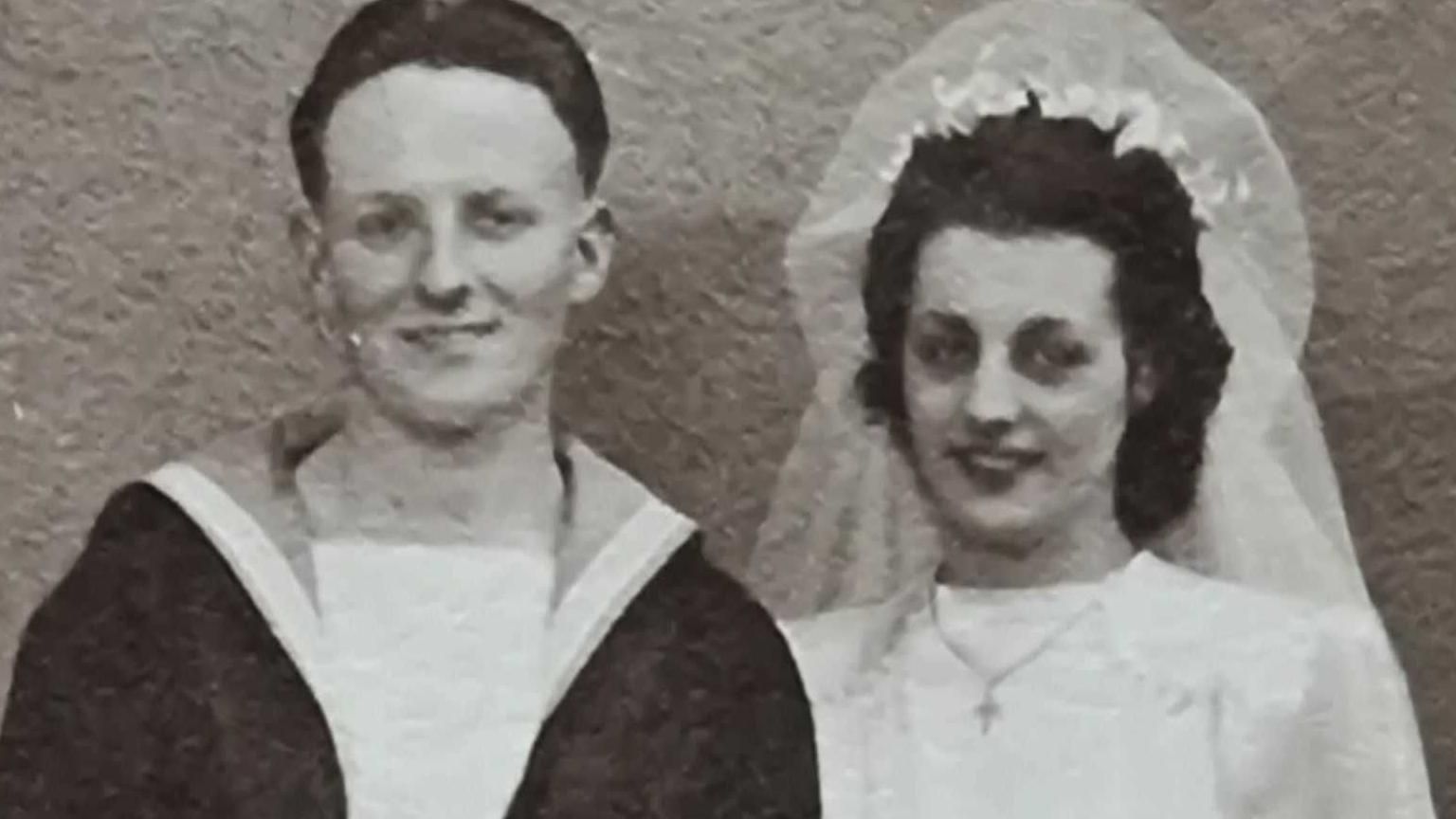 Black and White photo of Mr Bartlett in his naval uniform and his wife in a wedding dress
