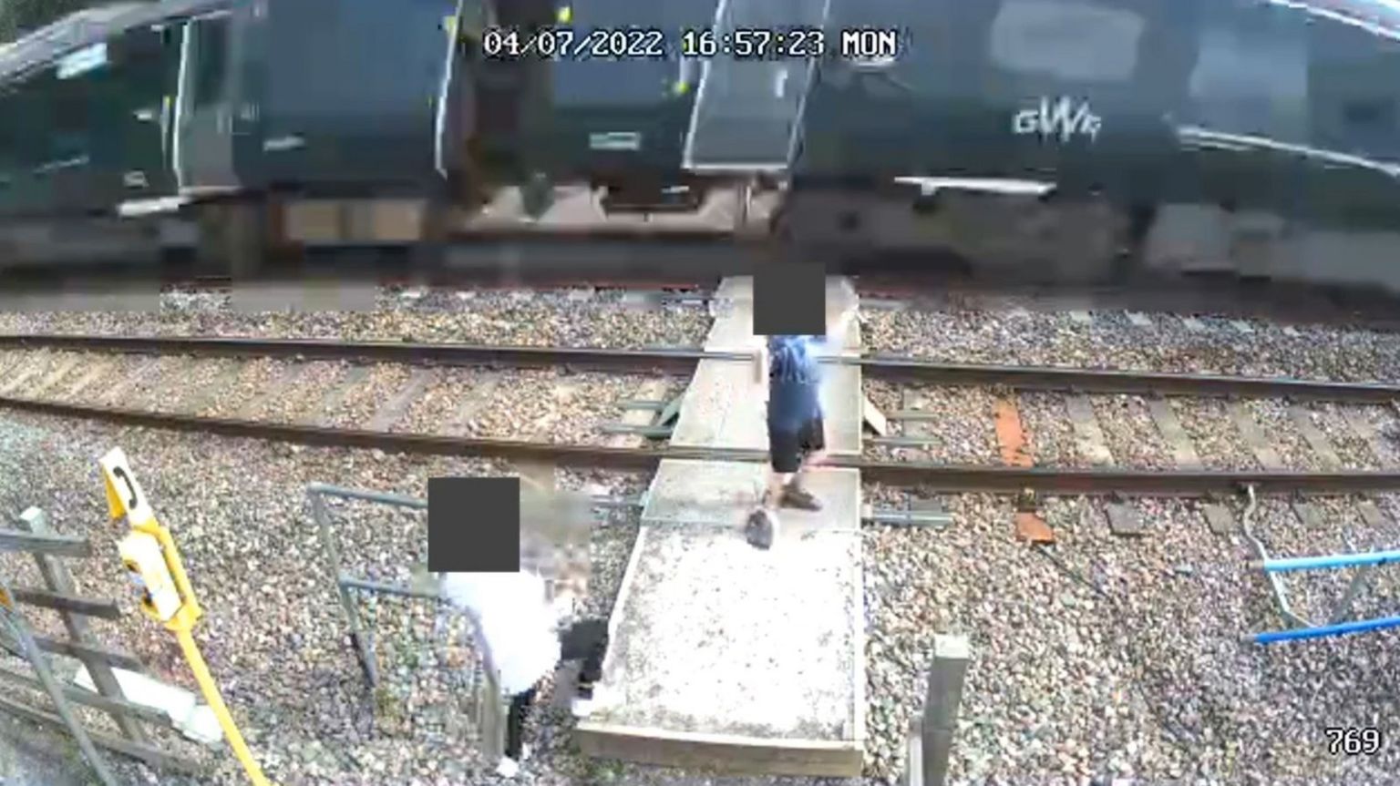 CCTV of children playing on tracks
