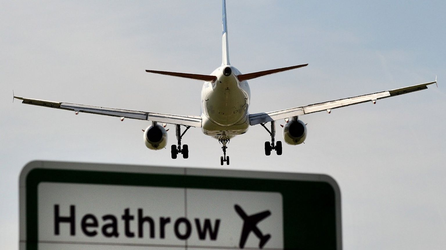 Plane with Heathrow sign