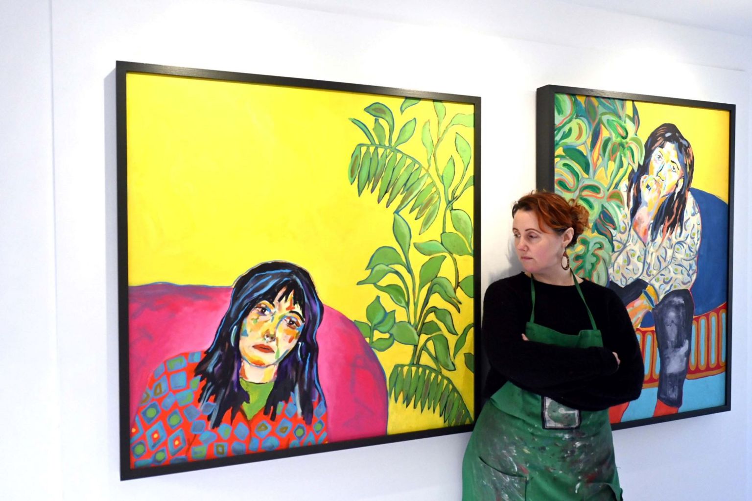 Natalie Chapman with two of her artworks