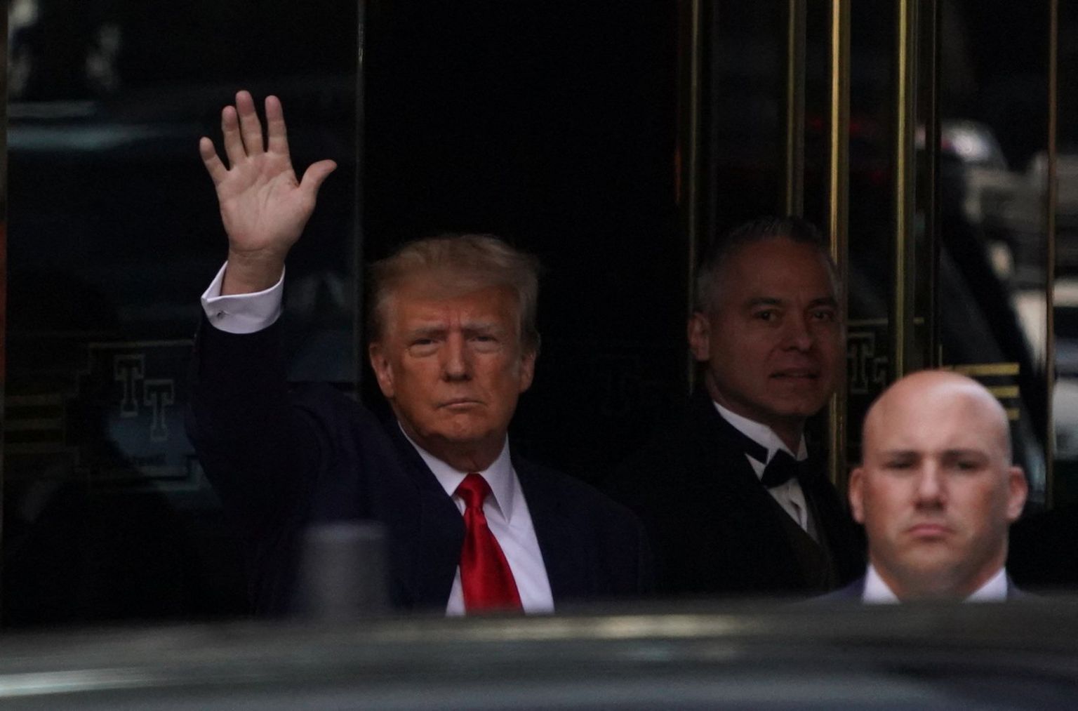 Donald Trump leaves Trump Tower