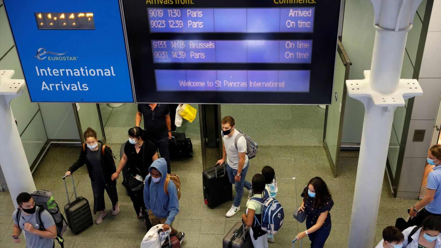 Passengers arrive from Paris at Eurostar terminal in London as Britain imposes a 14-day quarantine on arrival from France on August 14, 2020
