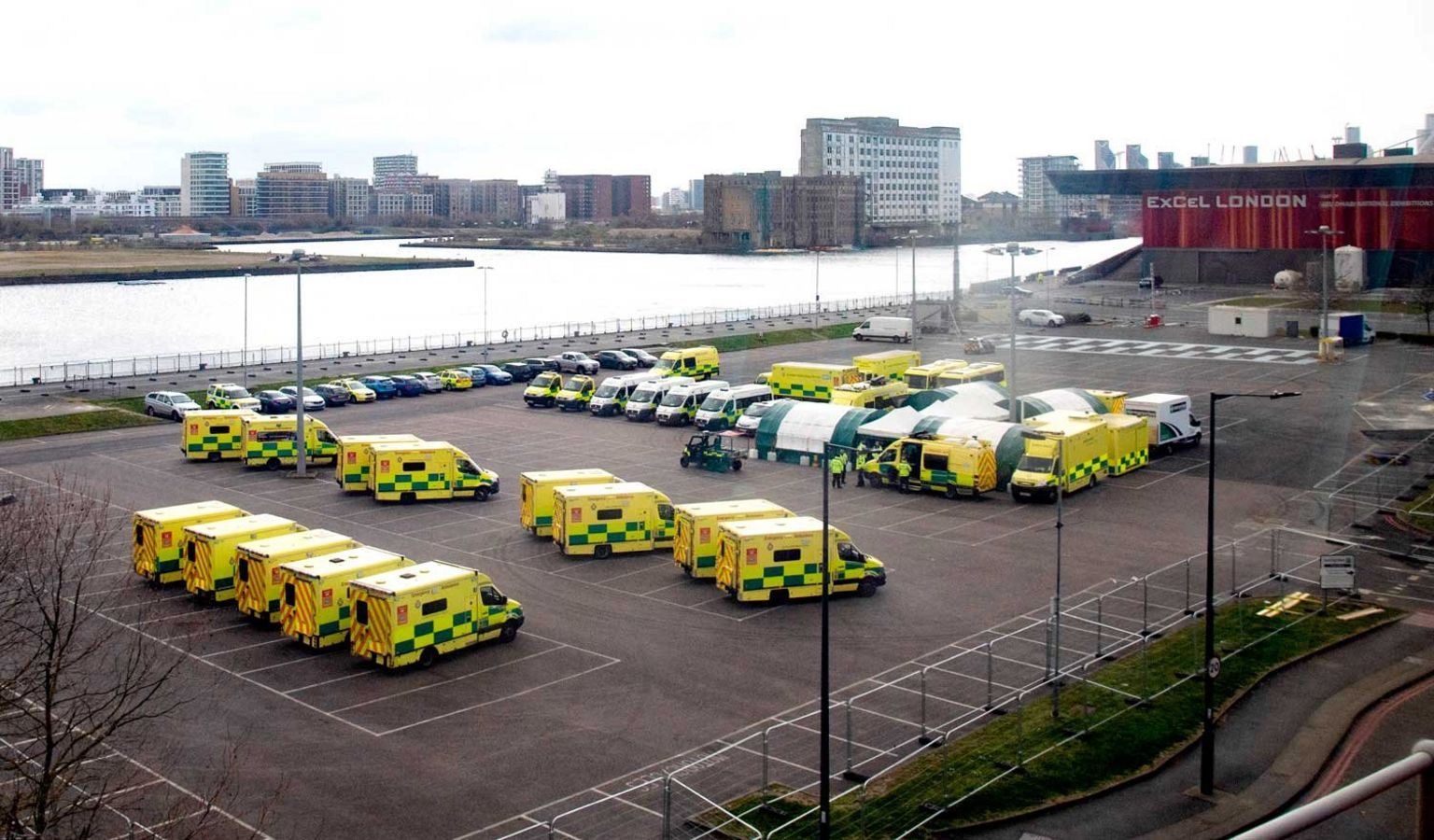 Ambulances seen parked outside the NHS Nightingale Hospital