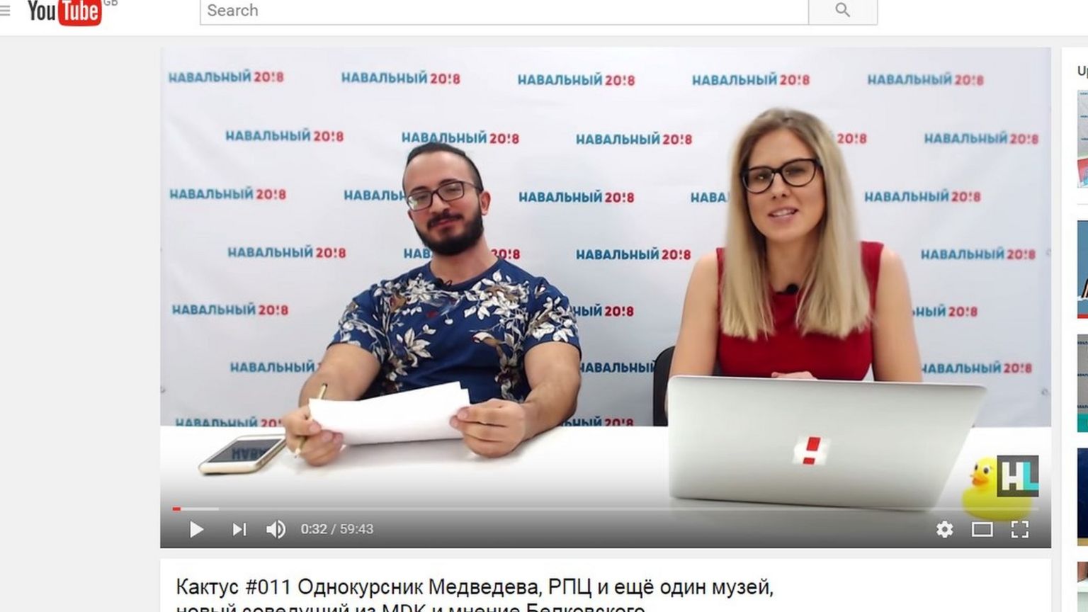 Lyubov Sobol (right) presents the news via her YouTube channel