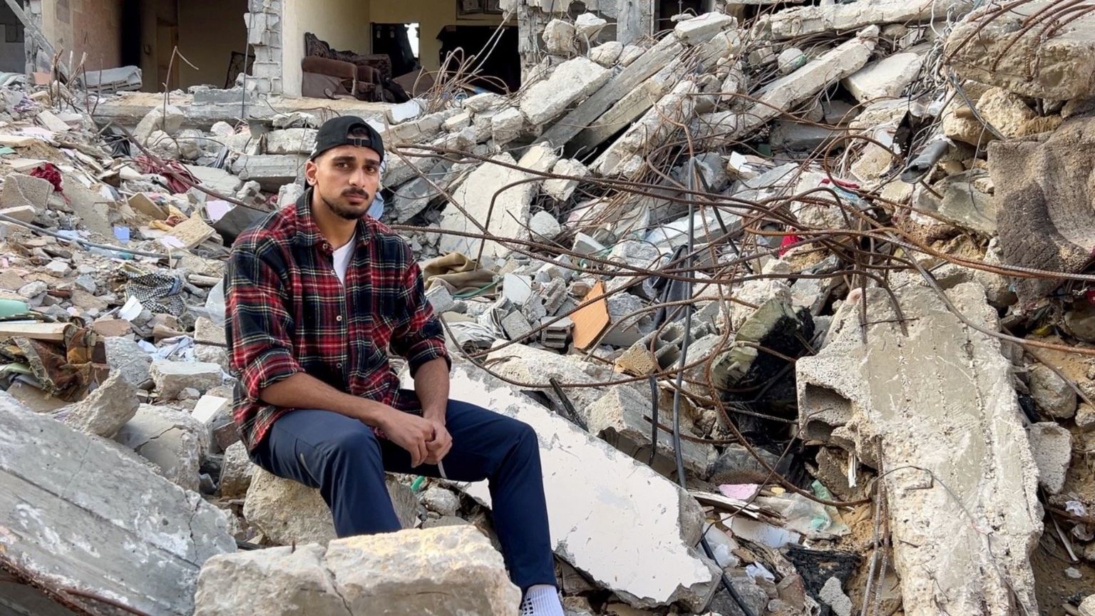 Ibrahim Abuimeir by his home in Rafah Gaza, destroyed by bombing on October 30