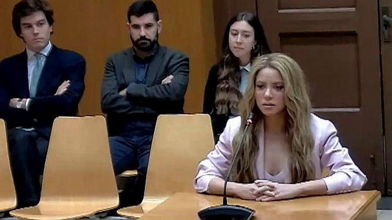 Shakira sitting in court