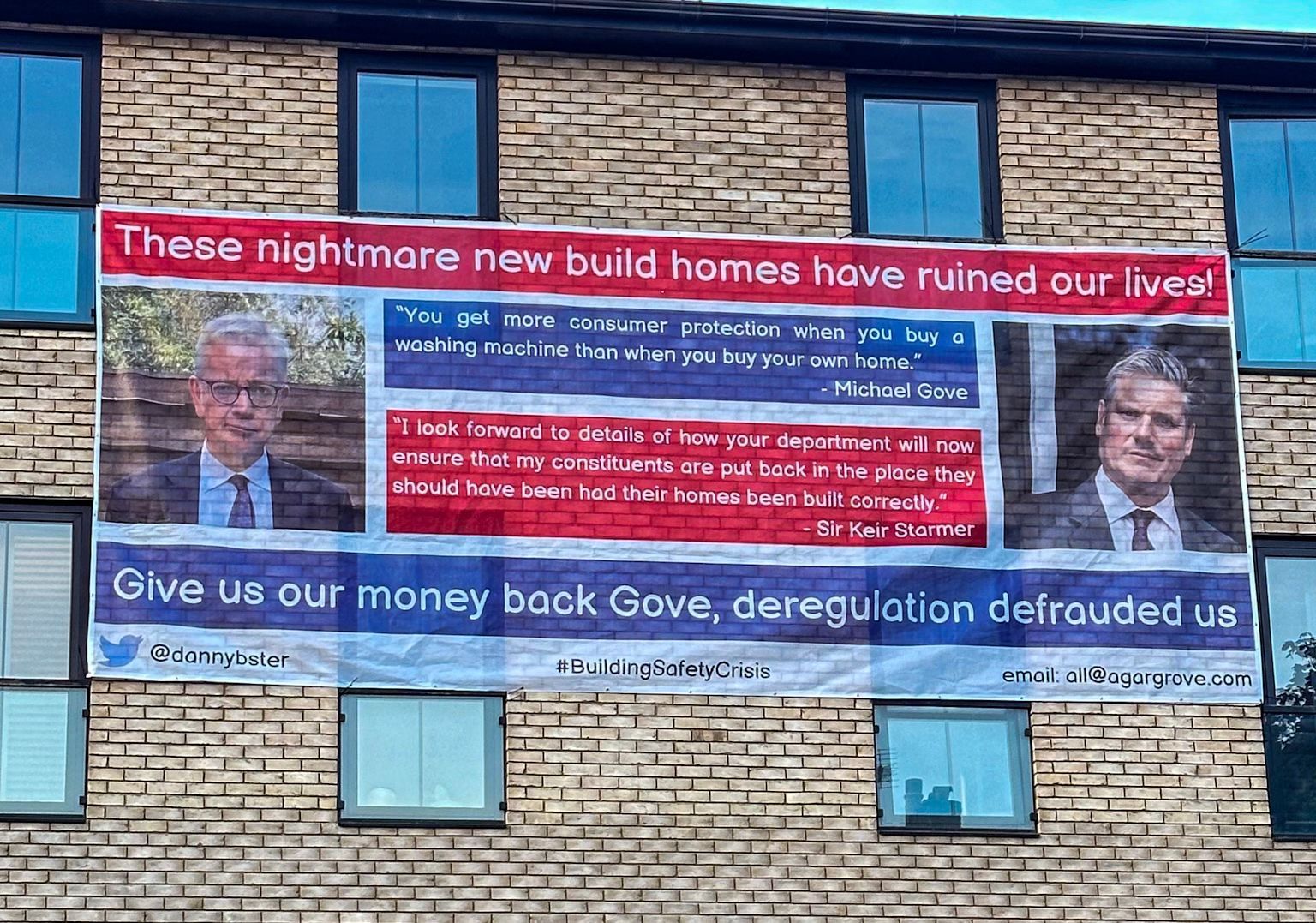 Agar grove with a banner outside with support expressed by housing minister Michael Gove and leader of the oppositionm, Keir Starker