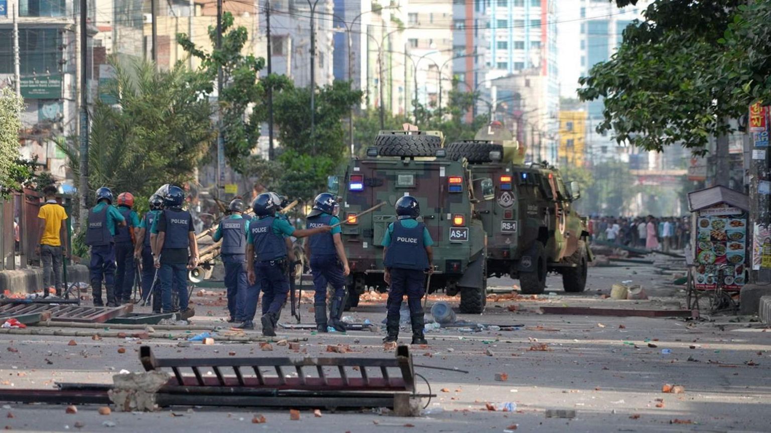 Riot police at the scene of protests in Dhaka