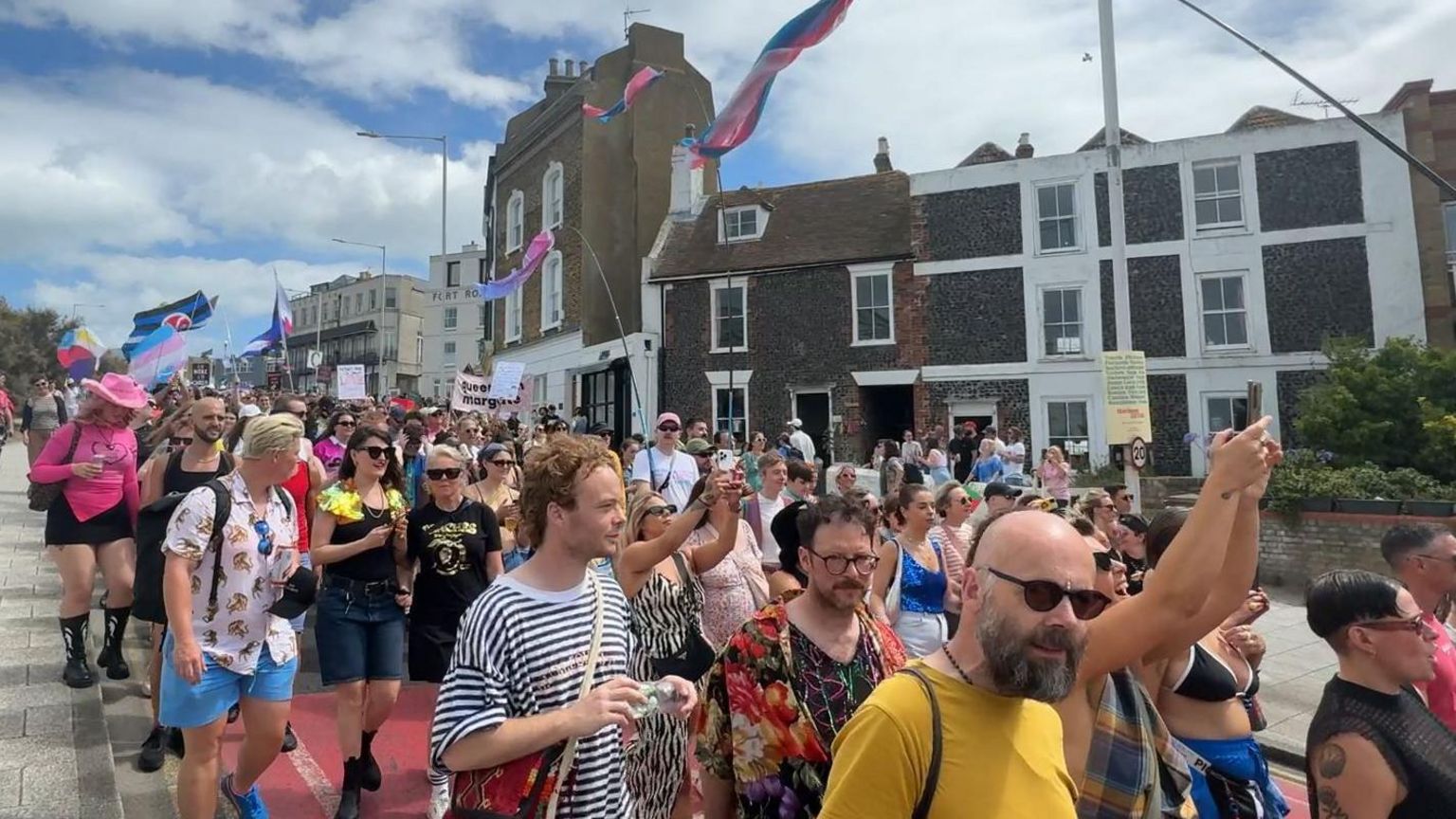 People taking part in a Pride parade in Margate on Saturday