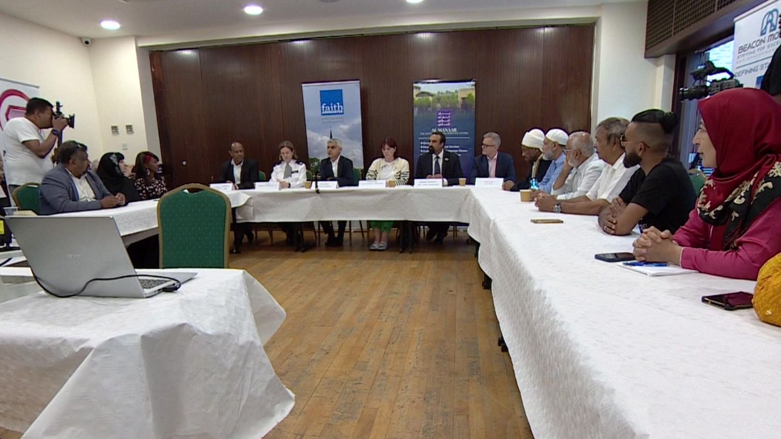 Mayor at training session on security - he sits at a long table at Al Manaar, the Muslim Cultural Heritage Centre in west London