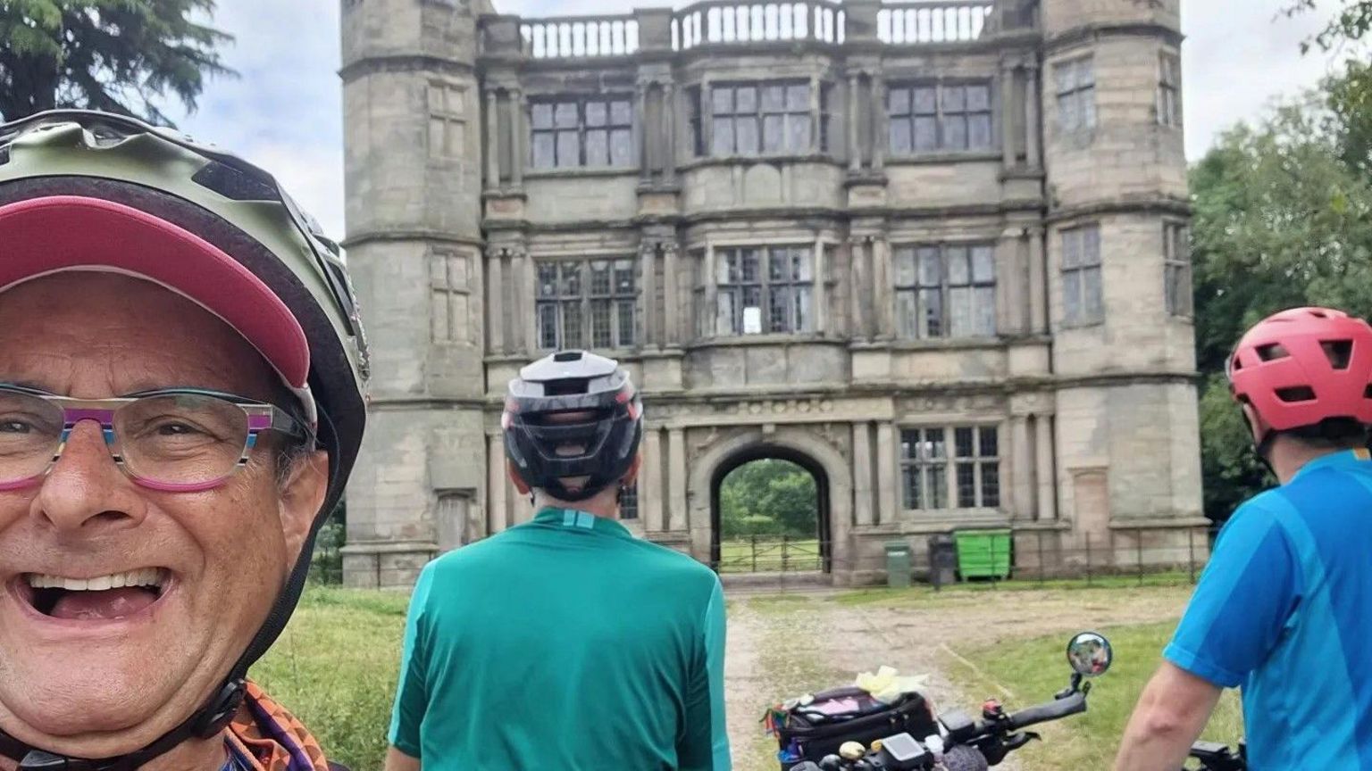 Timmy Mallet and two friends in front of the Tixall Gatehouse