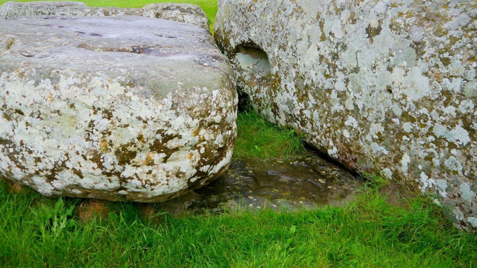 The Altar Stone beneath two others