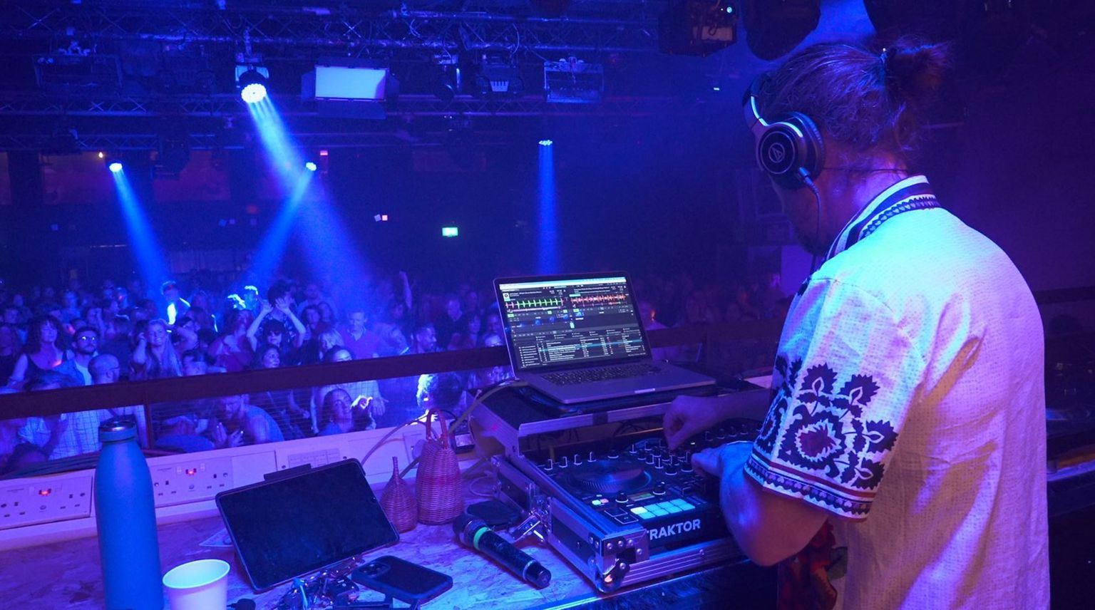 DJ in front of a crowd