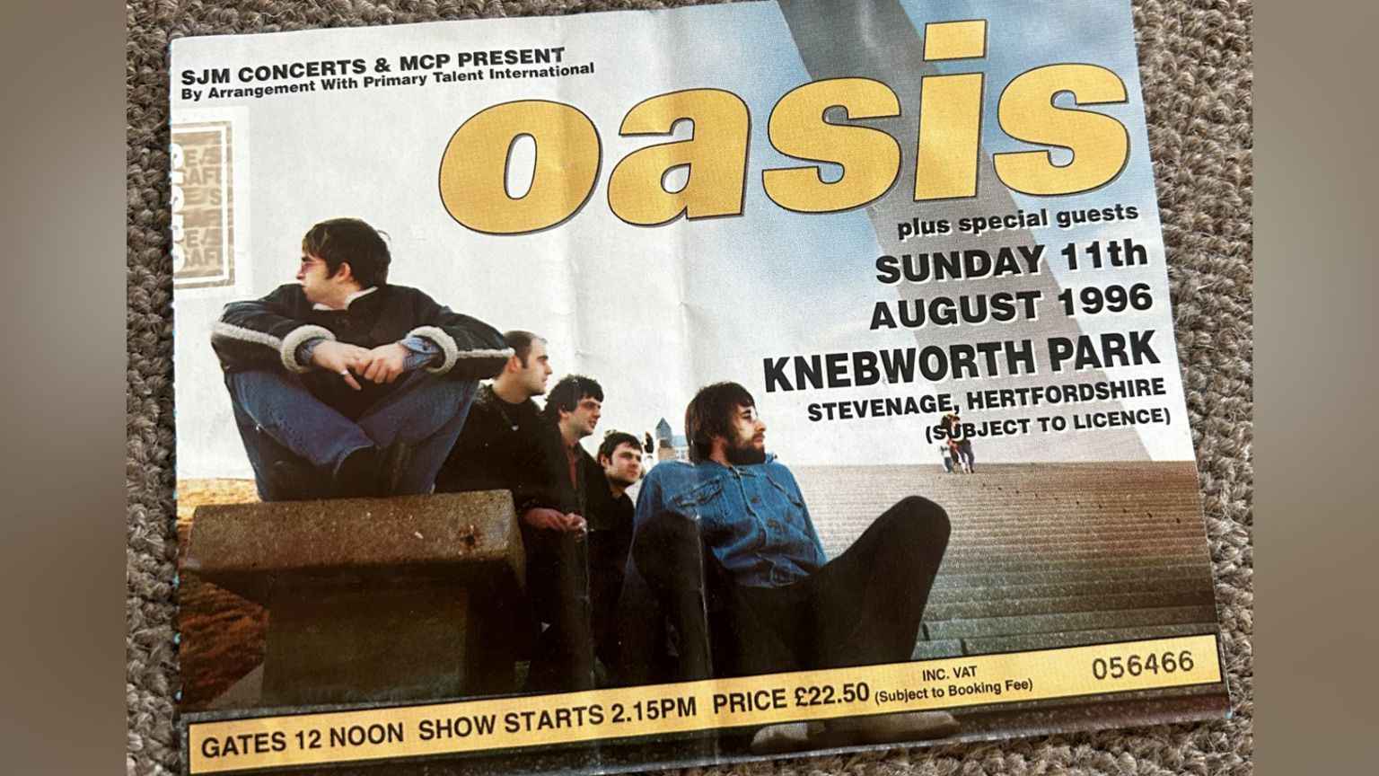 A ticket for the Oasis gig at Knebworth showing a photo of the band