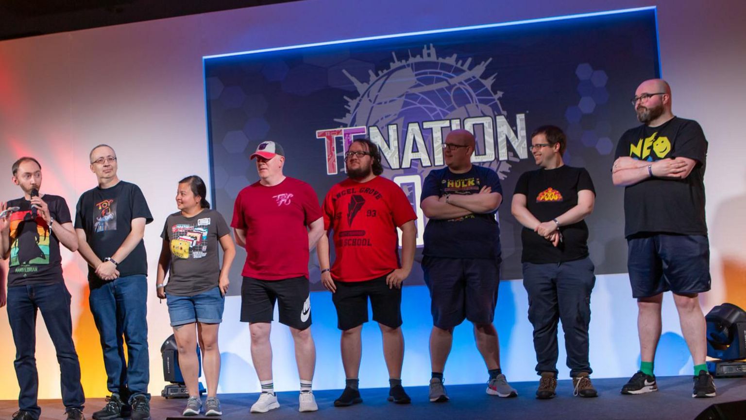 The Toy-Fu team at TF Nation 2023, with founder Nicholas Davidson speaking 