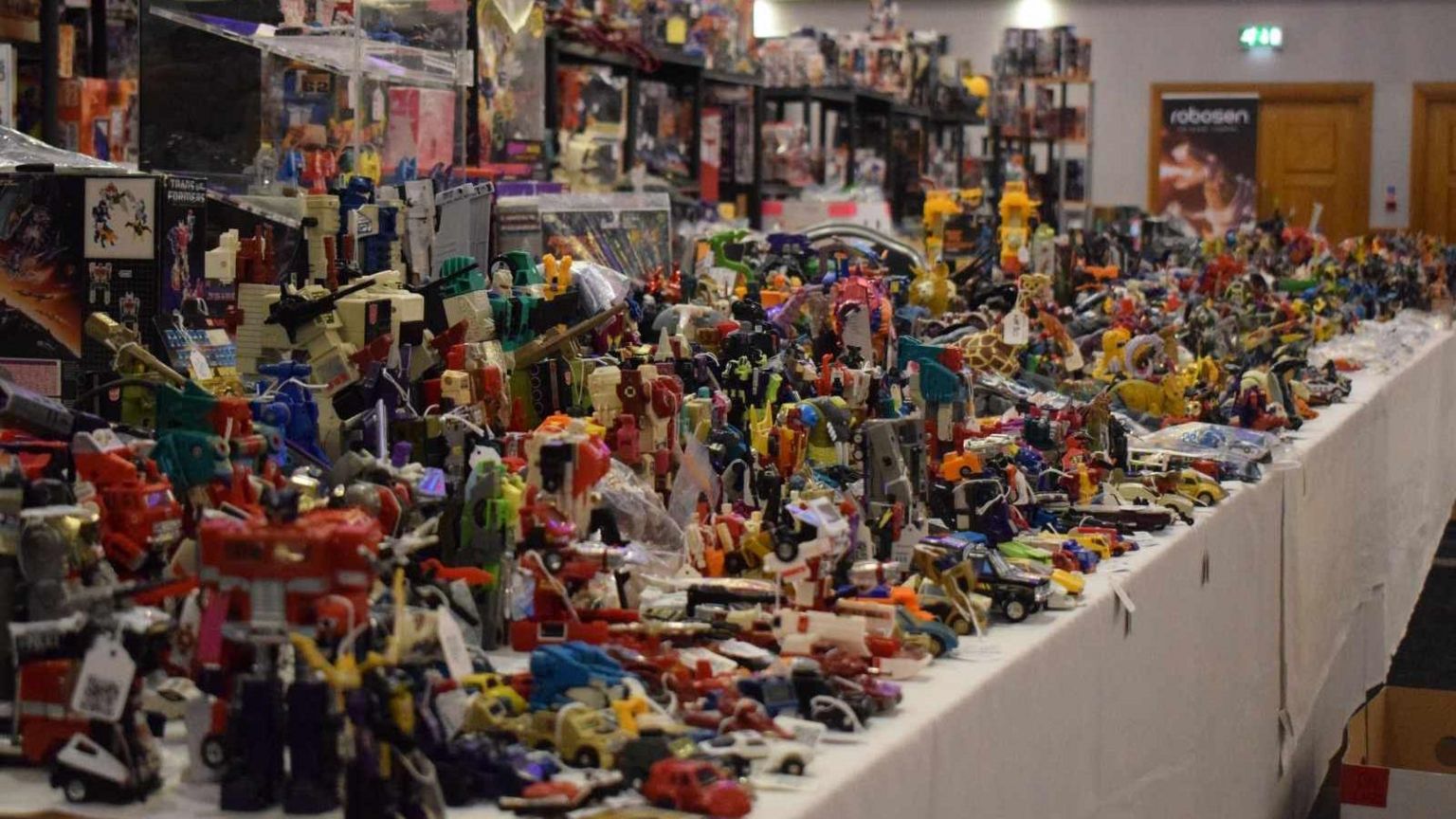 Some of the many Transformers being sold by Toy-Fu at TF Nation in 2024