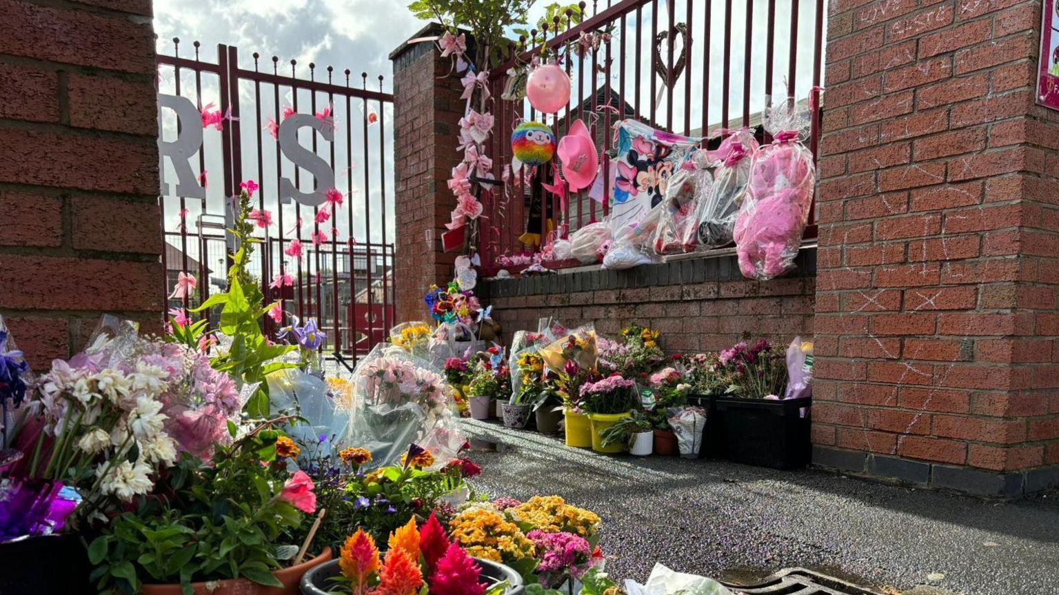 Flowers outside school gates of Farnborough Road School