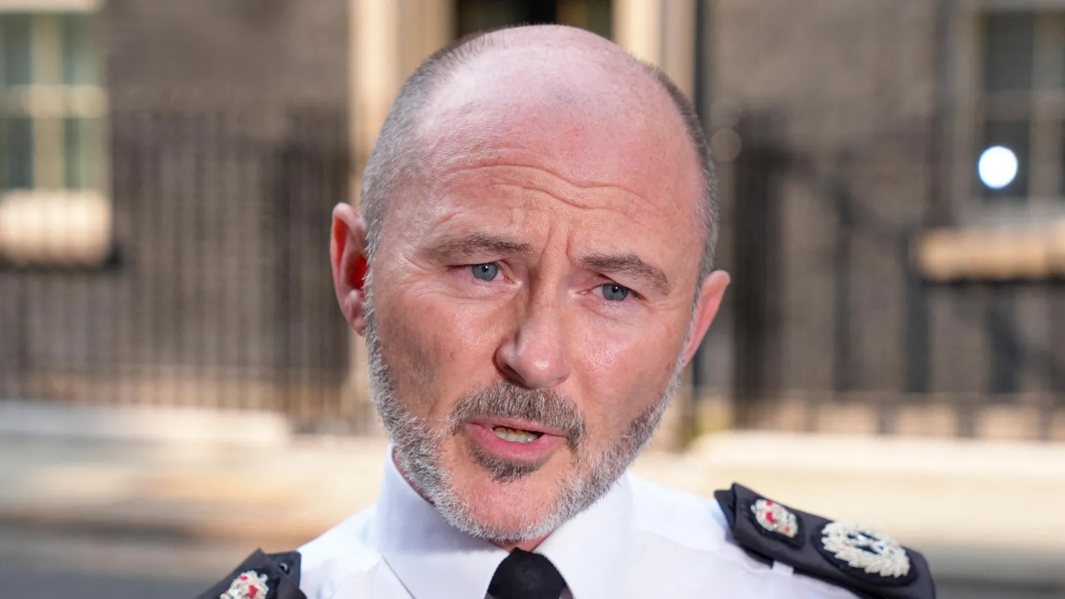 Reuters A head and shoulders pictures of Chief Constable Gavin Stephens, he is in uniform speaking at an earlier unrelated interview outside downing street which is visible blurred in the background