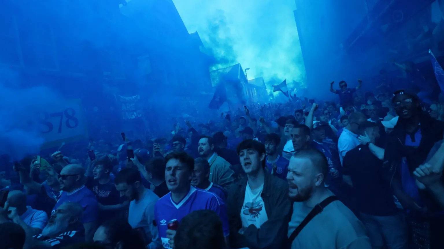 Reuters The air turned blue with flares ahead of kick-off with a large crows pictured in blue smoke